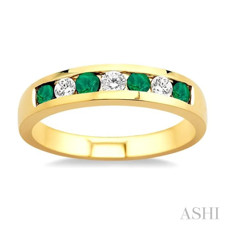 1/5 Ctw Channel Set Round Cut Diamond and 2.5 MM Round Cut Emerald Band in 14K Yellow Gold