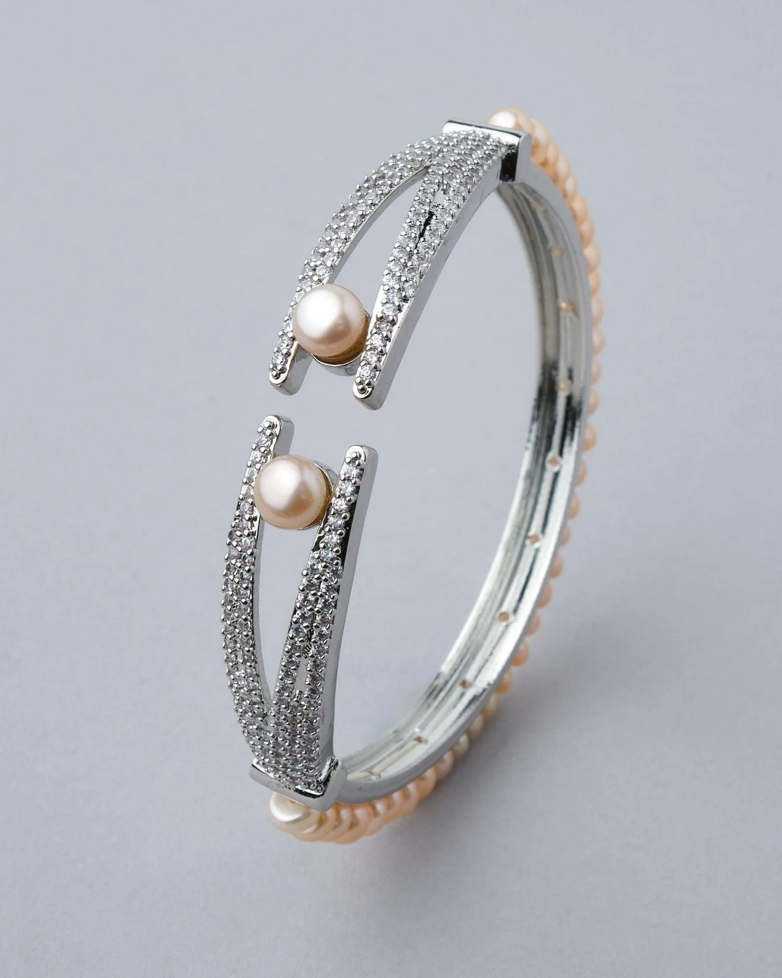 Delightful Stone Studded Pearl Bangle