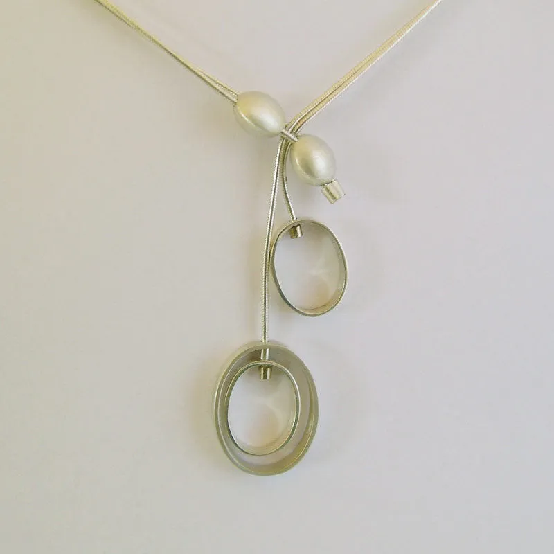 Oval Moving Neckpiece